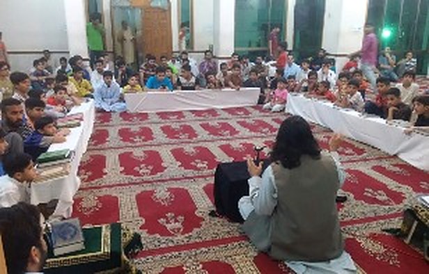 Students and parents at a Qirat programme